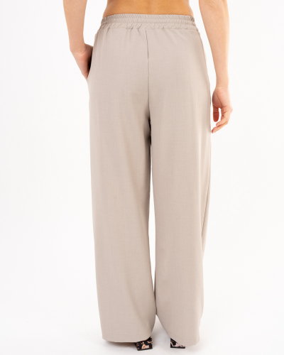Pantalon bouton doré