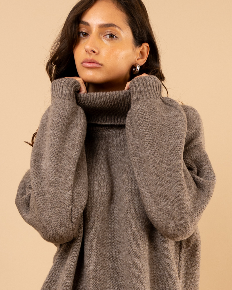 Pull long col roulé Pull long col roulé