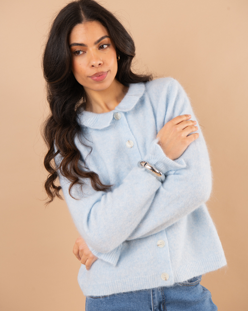 Gilet bords froufrou